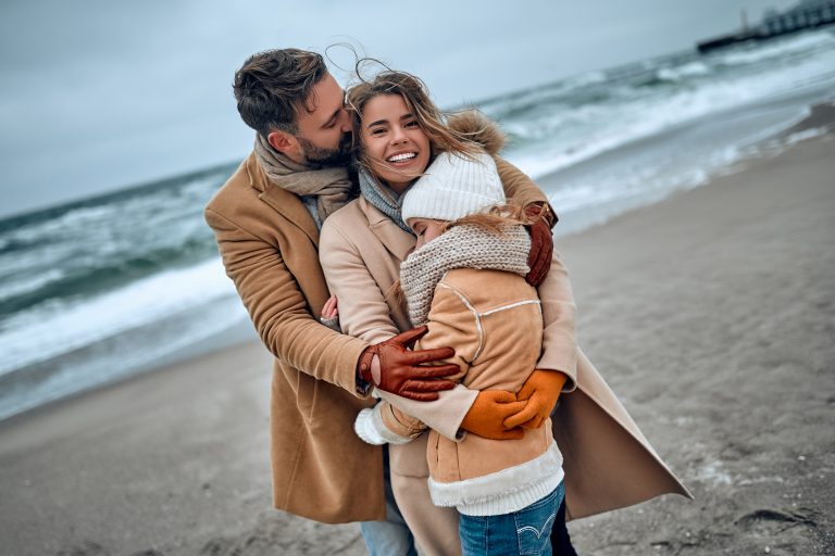 Portrait,Of,A,Young,Married,Couple,And,Their,Cute,Daughter