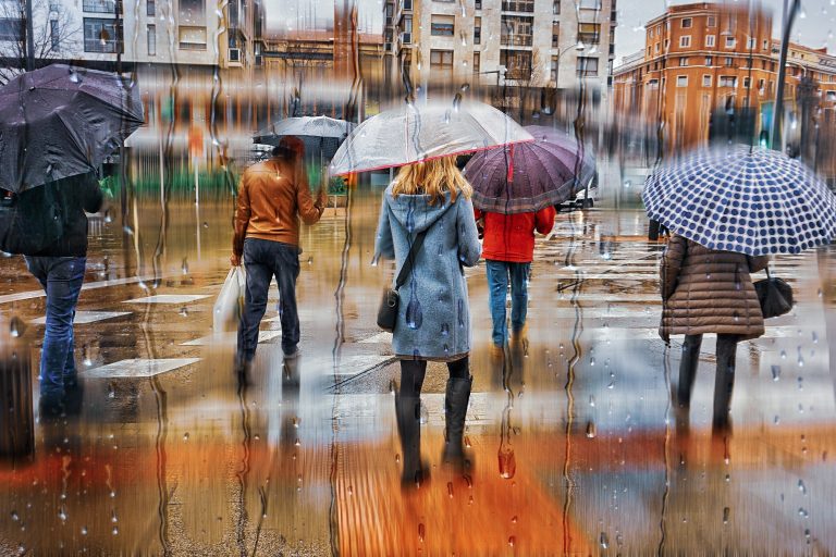 People,With,An,Umbrella,In,Rainy,Days,In,Bilbao,,Basque