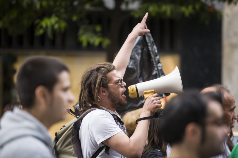 Badajoz,,Spain,-,March,29,,2012:,Young,Demostrator,With,Megaphone