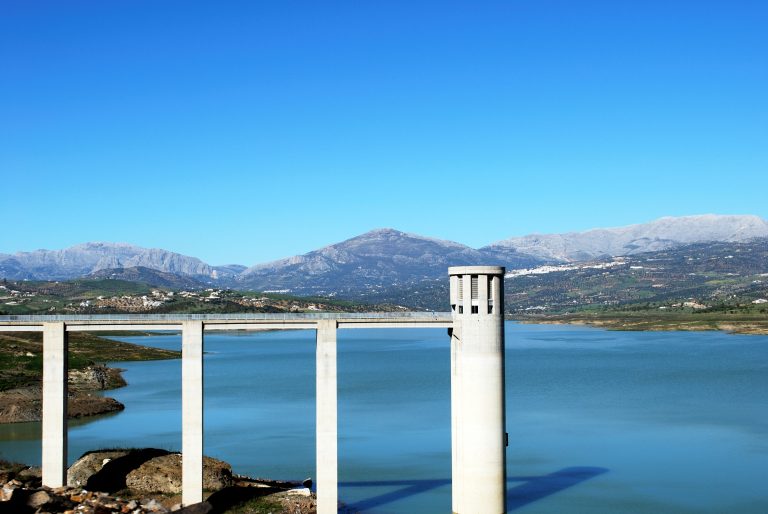 View,Of,Lake,Vinuela,With,Mountains,To,The,Rear,,La