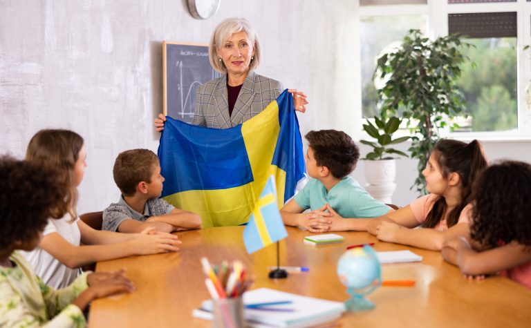 High,School,Teacher,Tells,Pupils,About,Sweden,And,Holds,The
