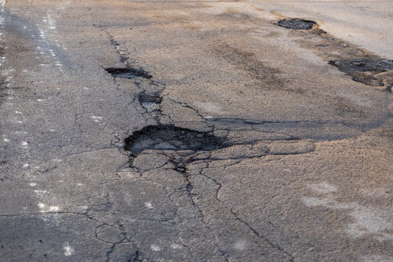 Potholes,In,The,Road,,Holes,In,The,Asphalt,On,The