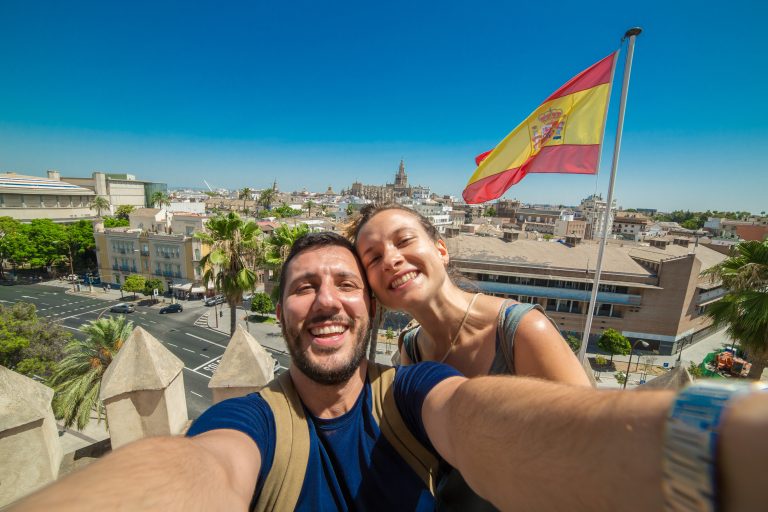 Handsome,Couple,Take,Selfie,Photo,In,The,Streets,Of,Sevilla,