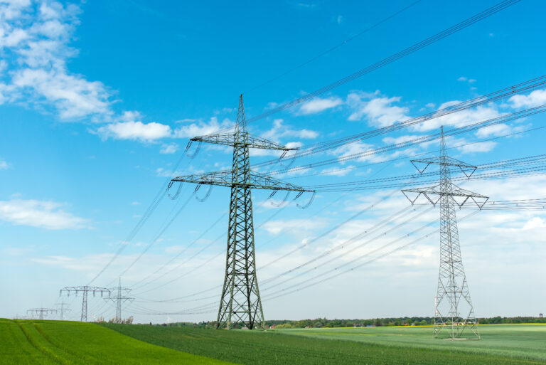 High-voltage,Lines,On,A,Sunny,Day,Seen,In,Germany